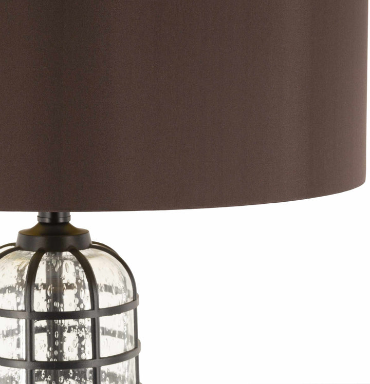 Lamp with brown shade and clear cage base on a white background

Binuatan Floor Lamp
