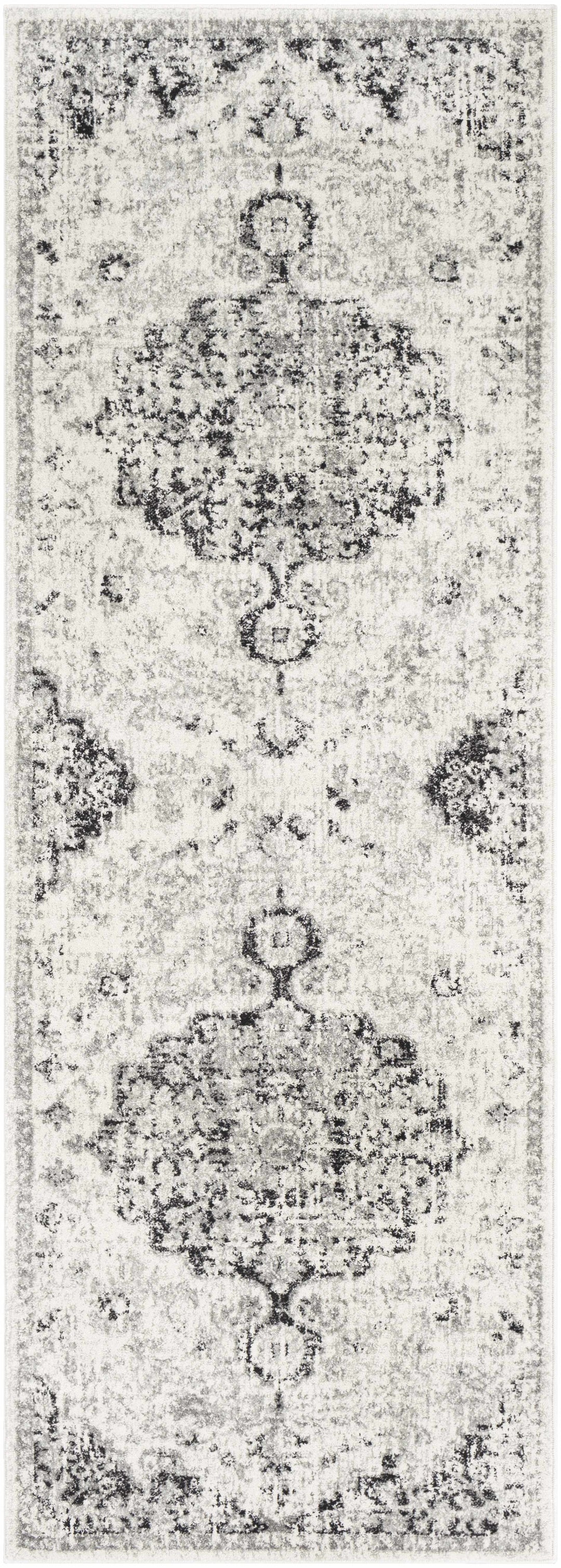 Decorative rug with a floral pattern on a white background

Bodrum Gray Area Rug