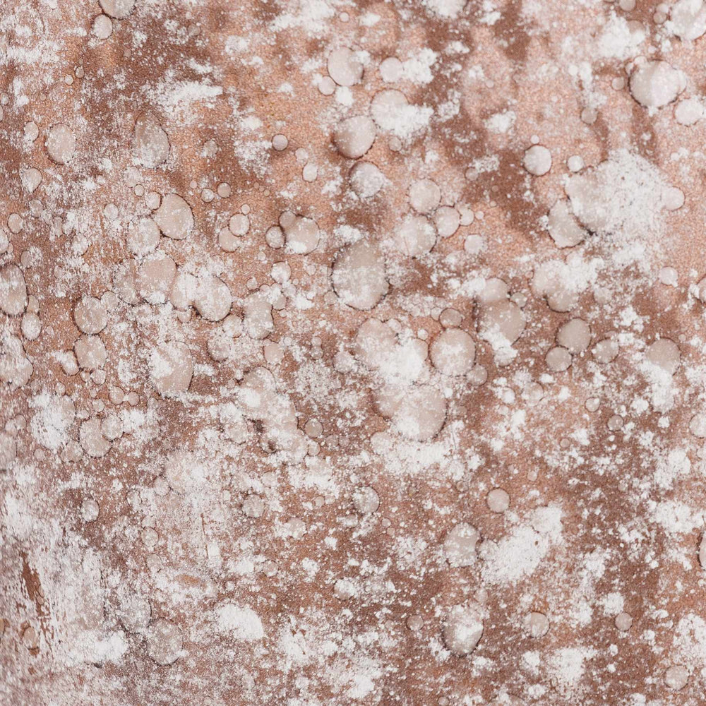 Close-up of a textured surface with a mix of brown and white colors

Calatugas Rustic Bronze Speckled Glass Decor