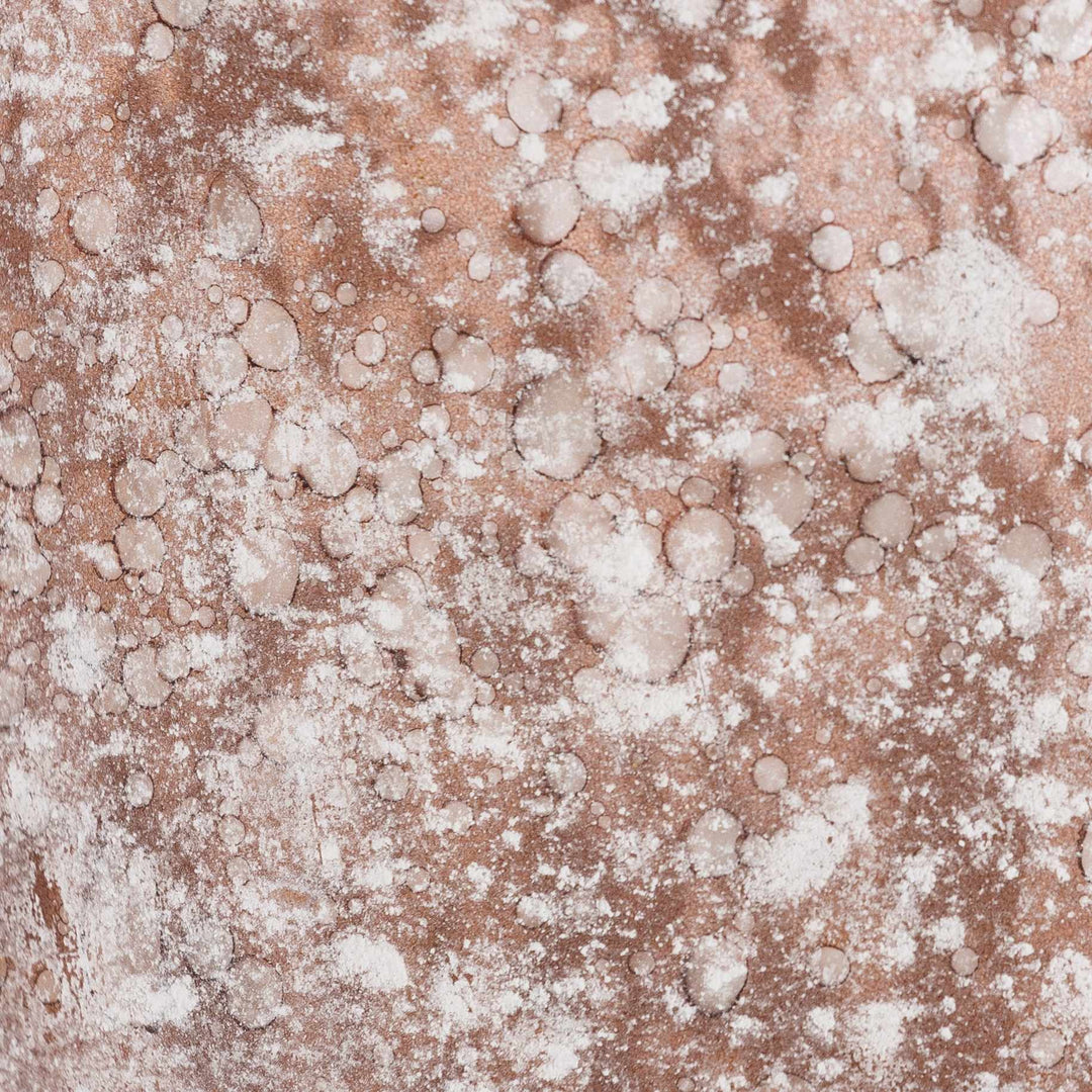 Close-up of a textured surface with a mix of brown and white colors

Calatugas Rustic Bronze Speckled Glass Decor