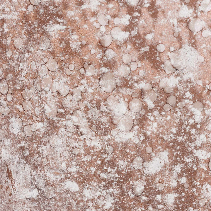 Close-up of a textured surface with a mix of brown and white colors

Calatugas Rustic Bronze Speckled Glass Decor