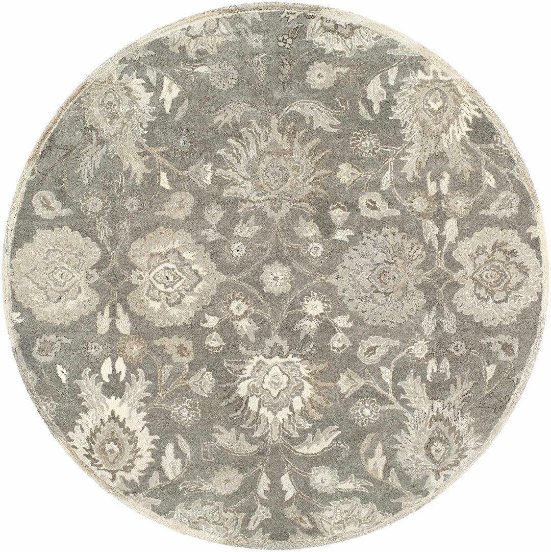 Round floral patterned rug with gray and beige colors on a white background

Conesus 1195 Hand Tufted Ivory & Taupe Wool Rug