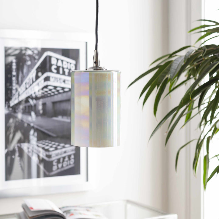 Pendant light fixture in a room with a plant and framed picture on the wall.

Guisborough Ceiling Light