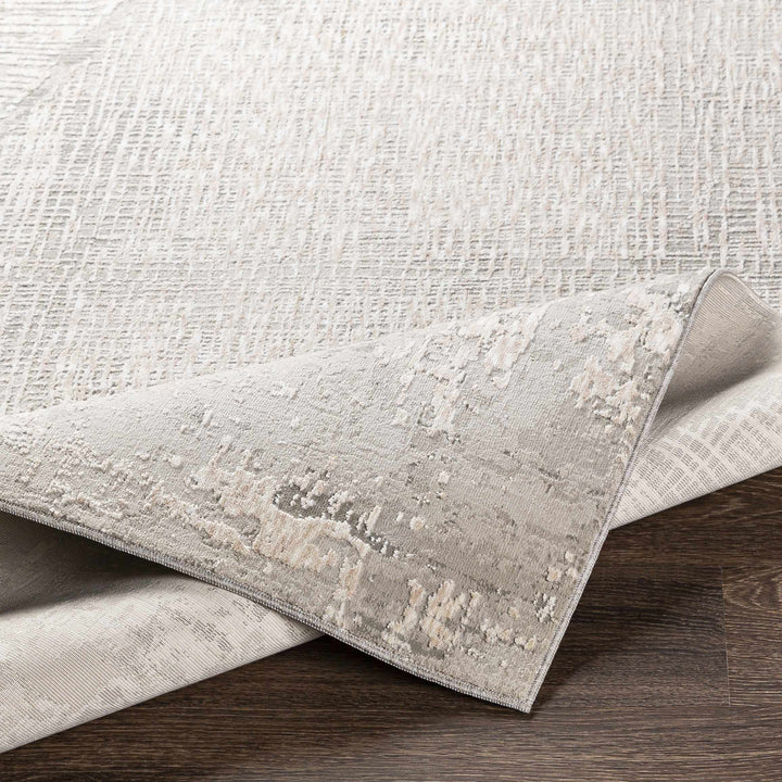 Close-up of textured gray rug on a wooden floor

Leeco Textured Luxe Rug