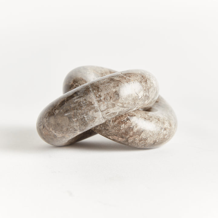 LINKED MARBLE RINGS SCULPTURE