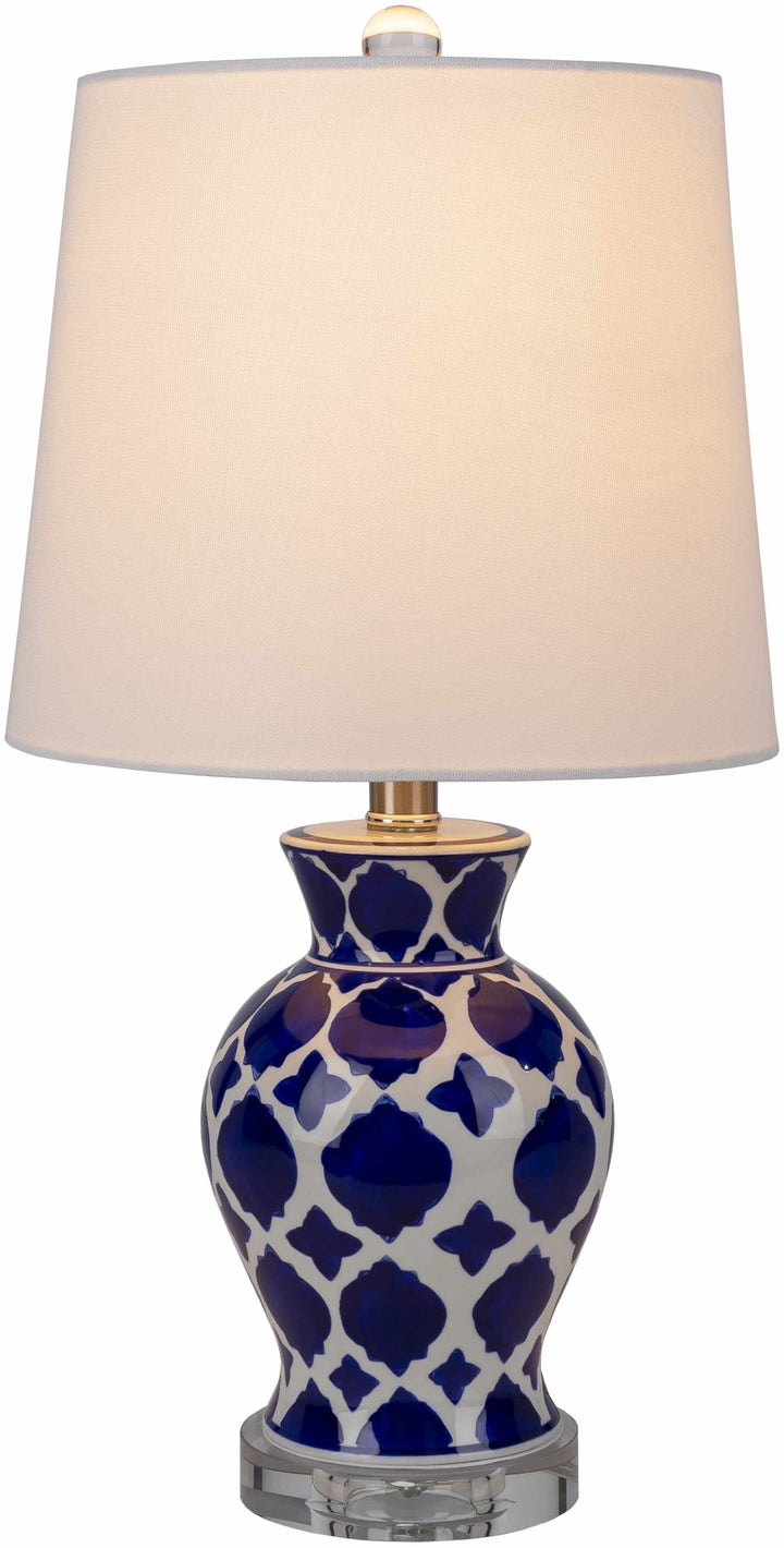 Table lamp with blue and white patterned base and beige lampshade on a white background

Pangian White & Blue Patterned Ceramic Table Lamp