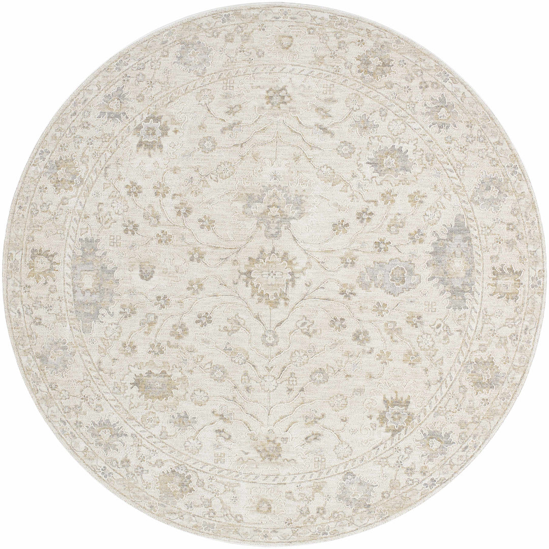 Round beige rug with floral pattern on a white background

Vaman Luxe Rug
