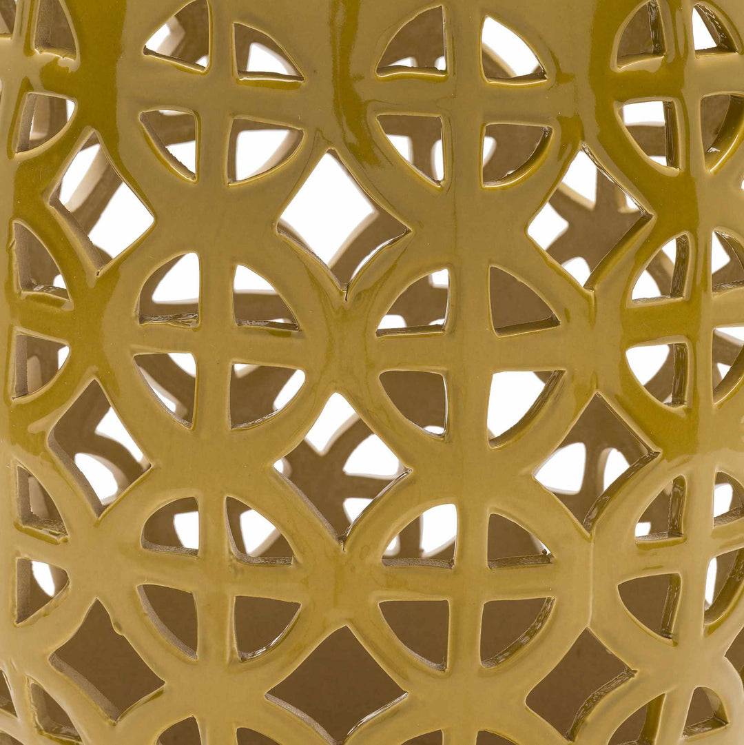 Close-up of a gold decorative lattice pattern

Yellow Ceramic Side Table