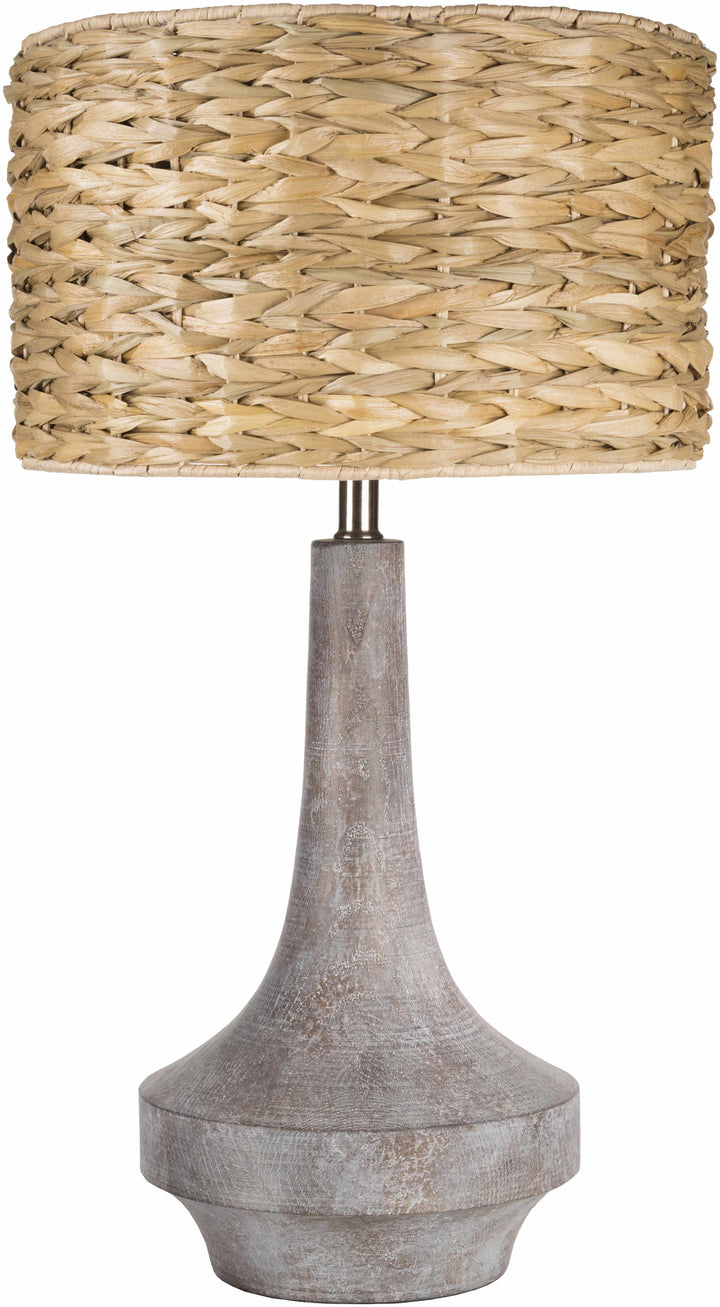 Table lamp with wicker shade and wooden base on a white background

Kabankalan Seagrass Resin Table Lamp
