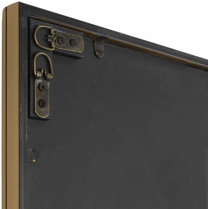 Close-up of a black painting with gold frame and hardware

Doyong Mirror