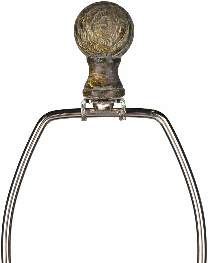 Metal stirrup with a decorative ball on a white background

Kabankalan Seagrass Resin Table Lamp