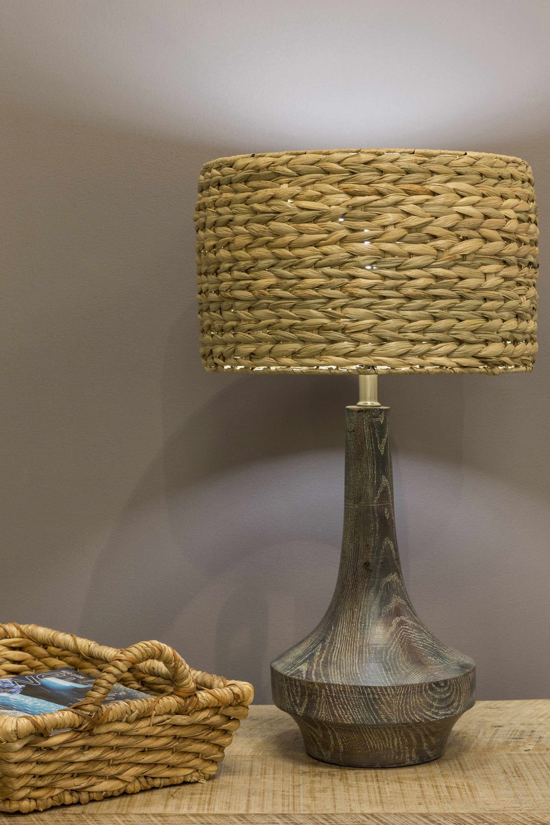 Table lamp with woven shade and textured base on a neutral background

Kabankalan Seagrass Resin Table Lamp