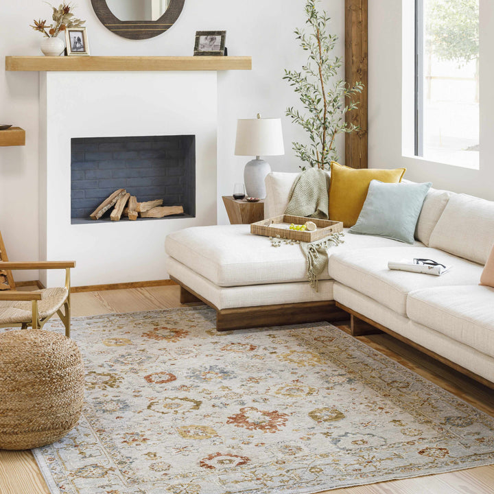 Living room with a sectional sofa, rug, and fireplace

Mogul Luxe Oushak Rug