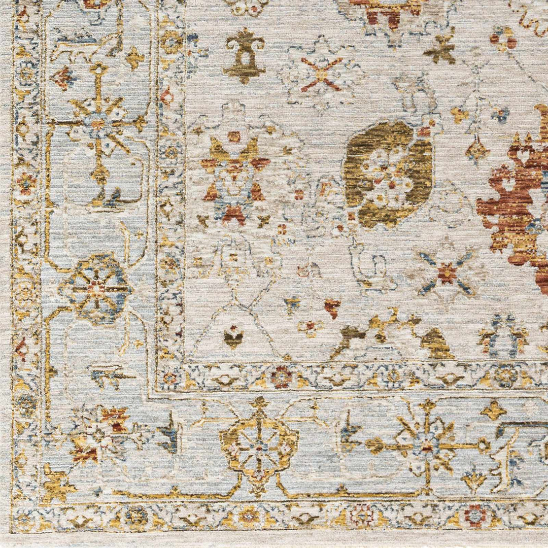 Close-up of a patterned rug with floral and geometric designs.

Mogul Luxe Oushak Rug