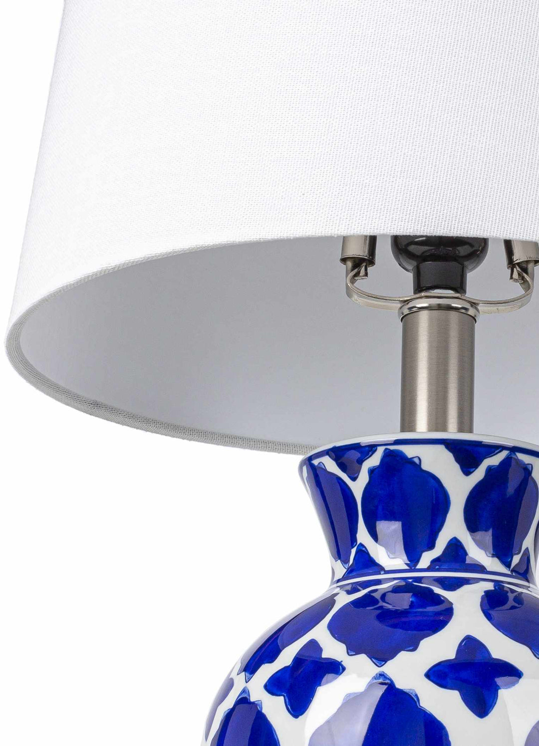 Table lamp with blue and white patterned base and white shade on a white background

Pangian White & Blue Patterned Ceramic Table Lamp
