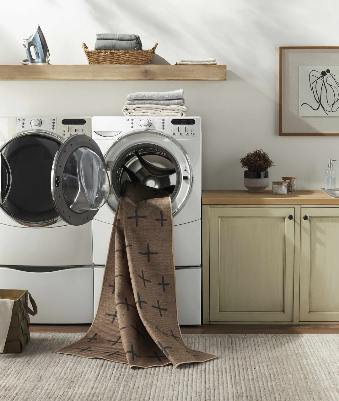 Laundry room with washer, dryer, and a towel draped over the dryer.

Haimi Black Washable Jutely Rug