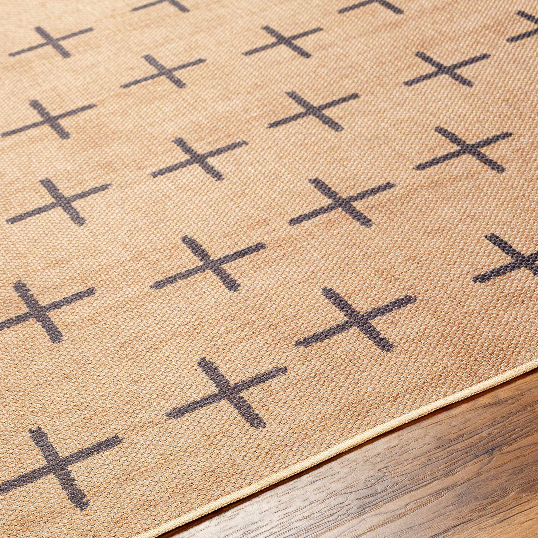 Beige rug with black cross pattern on a wooden floor

Haimi Black Washable Jutely Rug