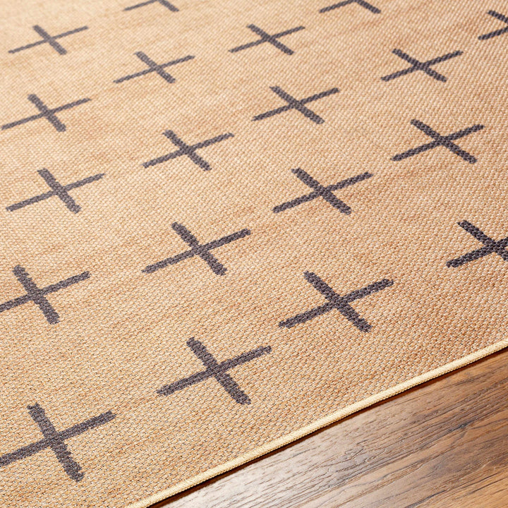 Beige rug with black cross pattern on a wooden floor

Haimi Black Washable Jutely Rug