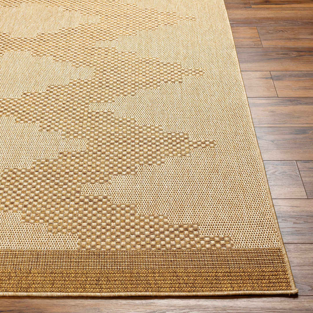 Beige woven rug on a wooden floor

Colum Flatweave Faux Jute Rug