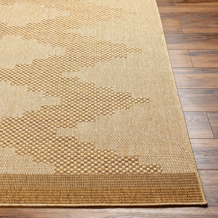 Beige woven rug on a wooden floor

Colum Flatweave Faux Jute Rug