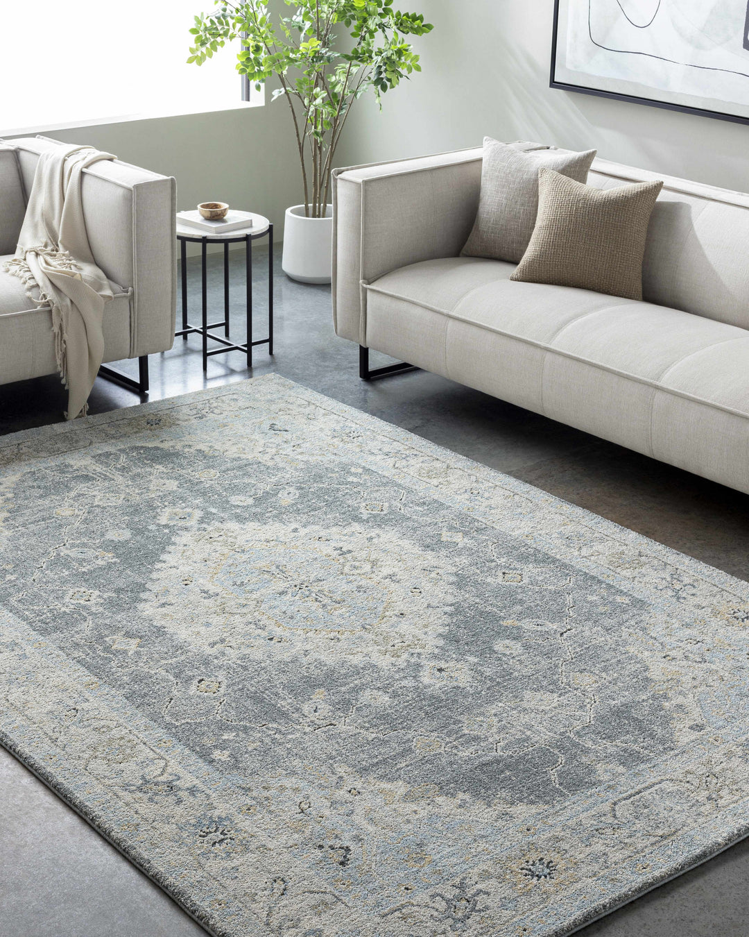 Decorative rug with a central medallion design on a light gray background

Tyche Tan Thick Luxe Area Rug