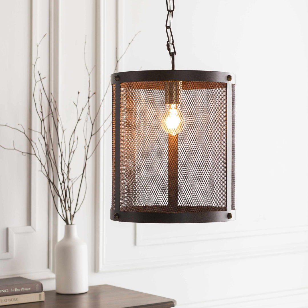 Mesh pendant light hanging in a room with a vase and books on a table.

Waldoboro Ceiling Light