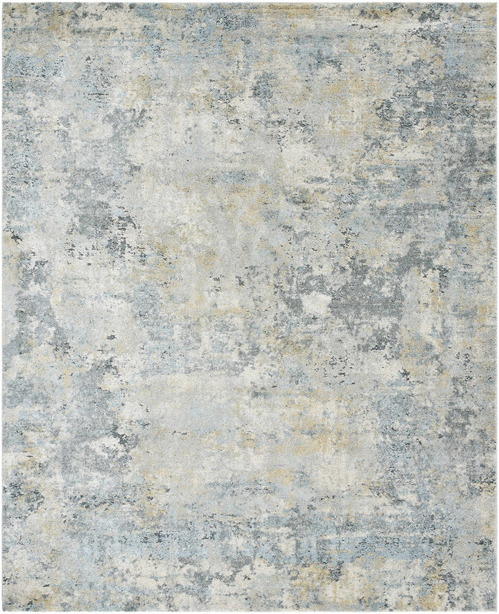 Abstract patterned rug with shades of blue, gray, and beige.

Adamma Thick Luxe Rug