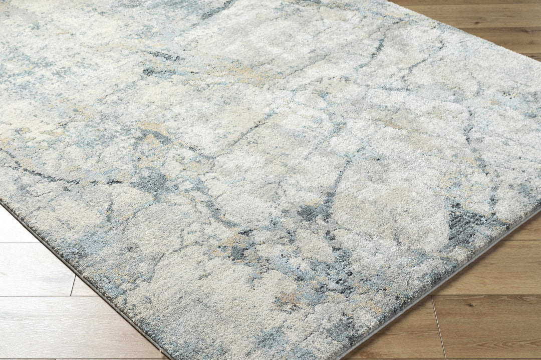 Textured area rug with a marble-like pattern on a wooden floor.

Urowo Light Gray Thick Luxe Rug