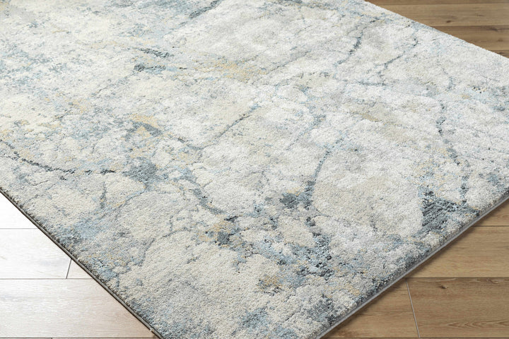Textured area rug with a marble-like pattern on a wooden floor.

Urowo Light Gray Thick Luxe Rug